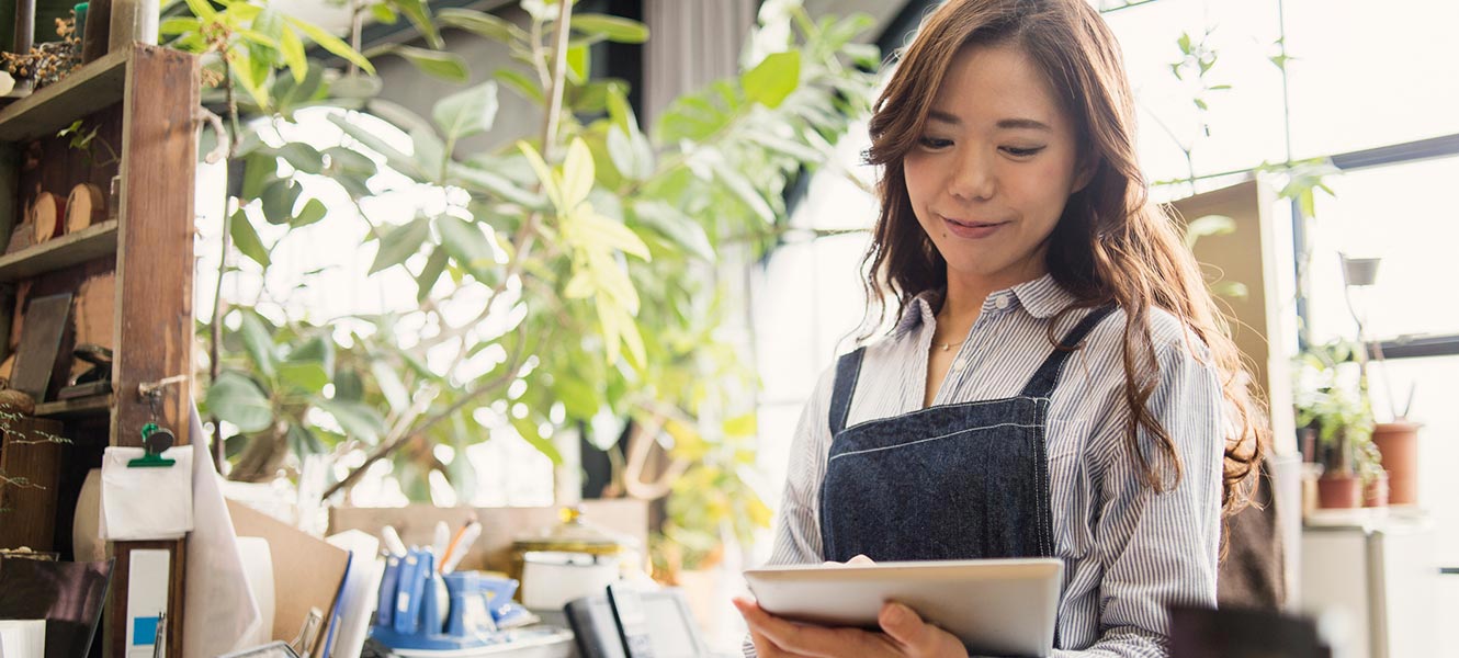 Business owner working on tablet