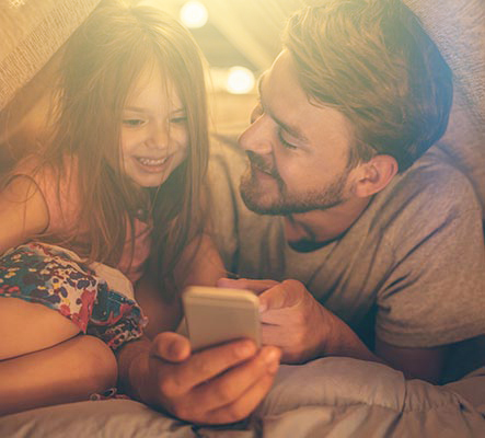 father and daughter on phone